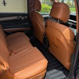 Brown leather rear seats inside a vehicle